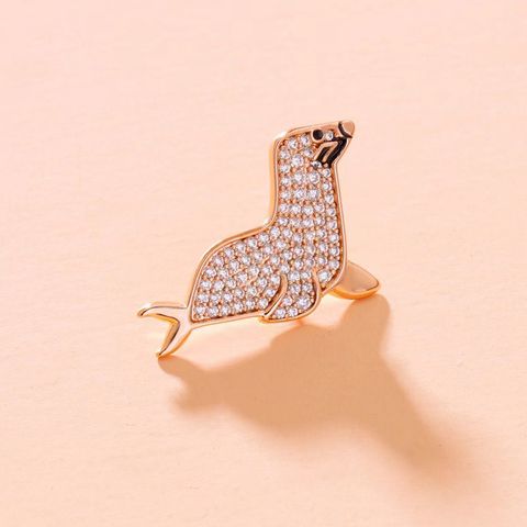 XUPING Simple Style Sea Lion Copper Plating Inlay Artificial Gemstones Unisex Brooches 1 Piece