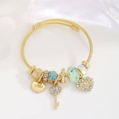 Casual Modern Style Classic Style Devil's Eye Bear Key Artificial Crystal Rhinestones Stainless Steel Alloy Wholesale Bangle