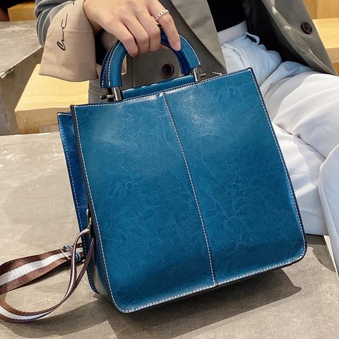Women's Medium Leather Solid Color Vintage Style Zipper Buckle Handbag