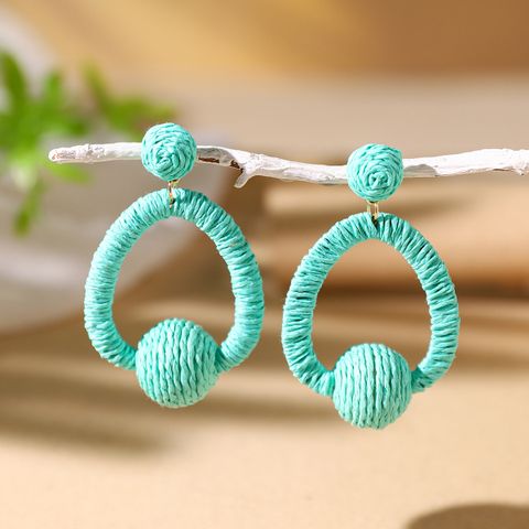 1 Pair Vacation Bohemian Circle Hollow Out Alloy Straw Rattan Drop Earrings
