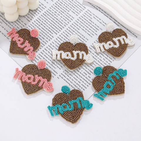 1 Pair Elegant Simple Style Letter Beaded Cloth Glass Ear Studs