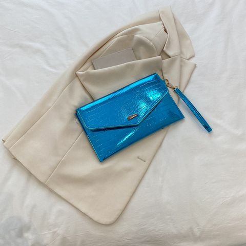 Women's Medium Pu Leather Solid Color Streetwear Magnetic Buckle Envelope Bag