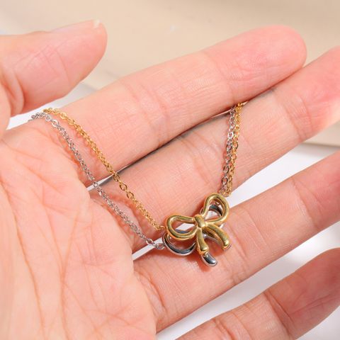 201 Stainless Steel 304 Stainless Steel Titanium Steel Gold Plated Elegant Lady Simple Style Solid Color Bow Knot Pendant Necklace