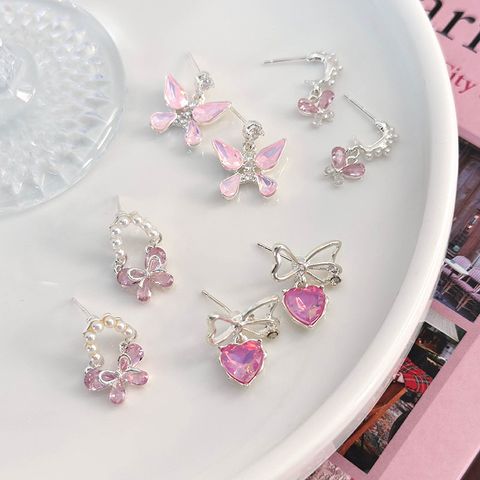 1 Pair Cute Lady Sweet Heart Shape Butterfly Inlay Artificial Pearl Copper Zircon Ear Studs