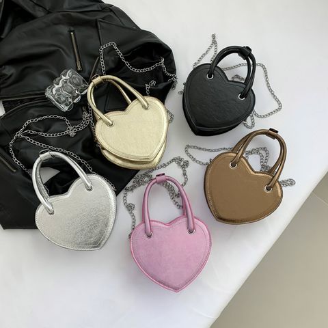 Women's Small Pu Leather Solid Color Streetwear Heart-shaped Zipper Crossbody Bag