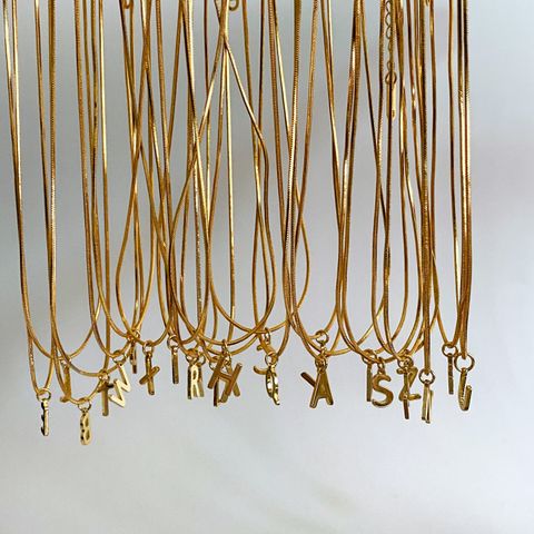 Wholesale Simple Style Commute Letter Copper 18K Gold Plated Pendant Necklace