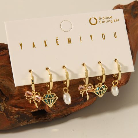 Copper 14K Gold Plated Casual Inlay Heart Shape Butterfly Bow Knot Artificial Pearls Zircon Ear Studs