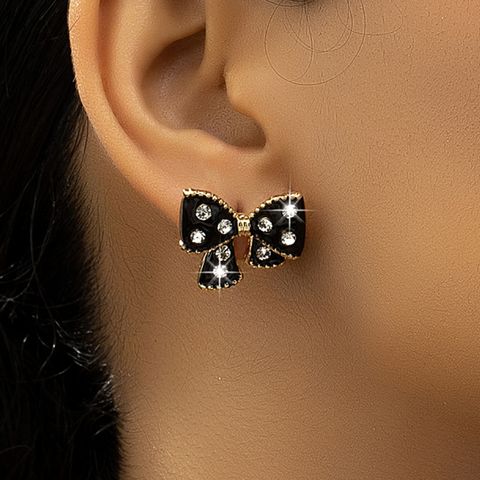 1 Pair Cute Bow Knot Inlay Plastic Zinc Alloy Rhinestones 14K Gold Plated Ear Studs