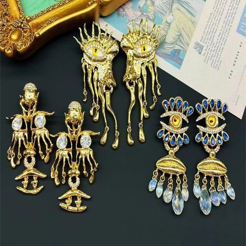 1 Pair Baroque Style Vacation Oversized Sun Eye Inlay Arylic Alloy Artificial Gemstones Artificial Rhinestones Artificial Pearls Gold Plated Drop Earrings
