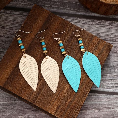1 Pair Ethnic Style Classic Style Leaves Pu Leather Alloy Iron Drop Earrings