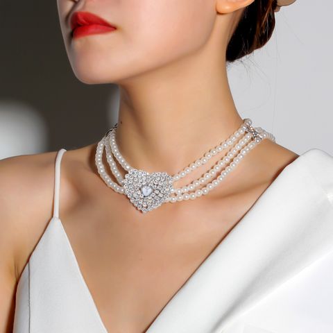 Wholesale Jewelry Glam Sweet Heart Shape Imitation Pearl Zinc Alloy Rhinestones Silver Plated Beaded Inlay Necklace