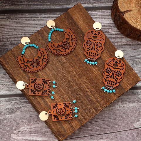 1 Pair Vintage Style Ethnic Style Geometric Skull Hollow Out Wood Drop Earrings
