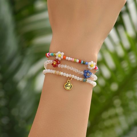 Style IG Sucré Forme De Cœur Fleur Cristal Artificiel Perle De Rocaille Perlé Placage Femmes Bracelets