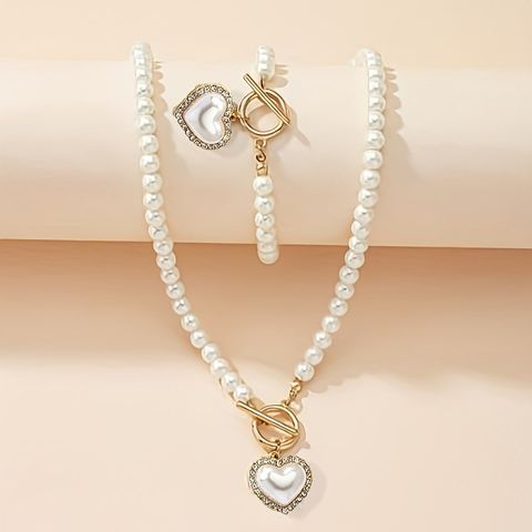 Aleación Elegante Señora Bohemio Embutido Forma De Corazón Perlas Artificiales Circón Pulsera Collar