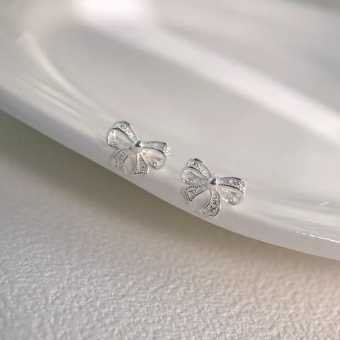 1 Pair Simple Style Bow Knot Hollow Out Sterling Silver Ear Studs