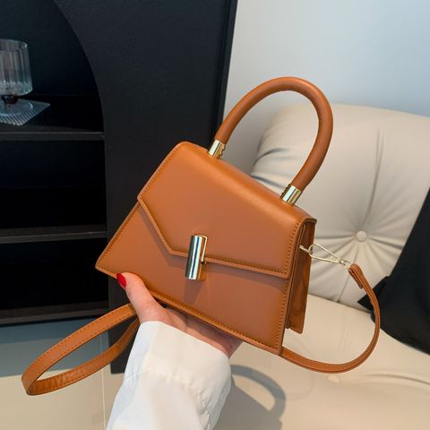 Women's Medium Pu Leather Solid Color Streetwear Lock Clasp Handbag Crossbody Bag