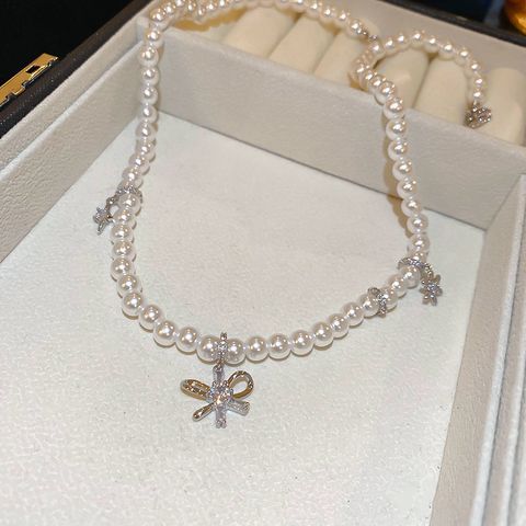 Casual Simple Style Bow Knot Zircon Imitation Pearl Copper Wholesale Bracelets Necklace