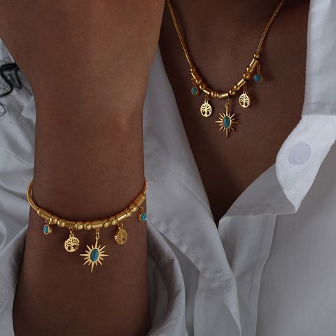 Style Simple Style Romain Soleil Turquoise Acier Au Titane Bracelets Collier En Masse