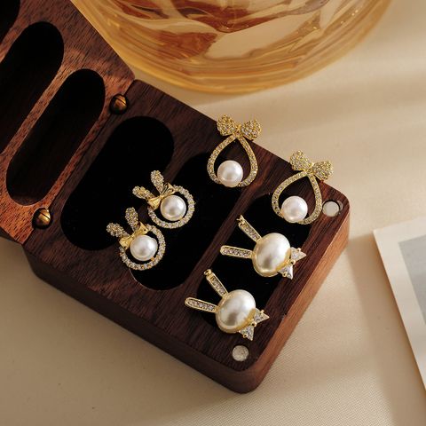 1 Pair Simple Style Shiny Rabbit Bow Knot Hollow Out Inlay Copper Crystal Beads Zircon 18K Gold Plated Ear Studs