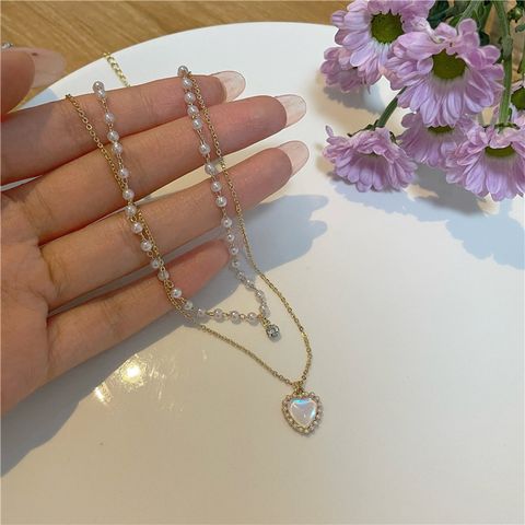 1 Piece Fashion Heart Shape Alloy Freshwater Pearl Patchwork Chain Women's Layered Necklaces