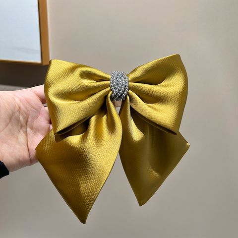 Women's Casual Sweet Bow Knot Cloth Beads Hair Clip