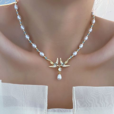 Simple Style Bird Imitation Pearl Plating 14K Gold Plated Women's Pendant Necklace
