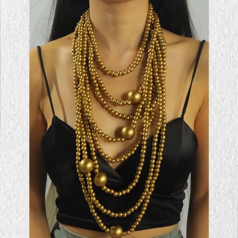 Casual Exaggerated Geometric Wooden Beads Women's Layered Necklaces