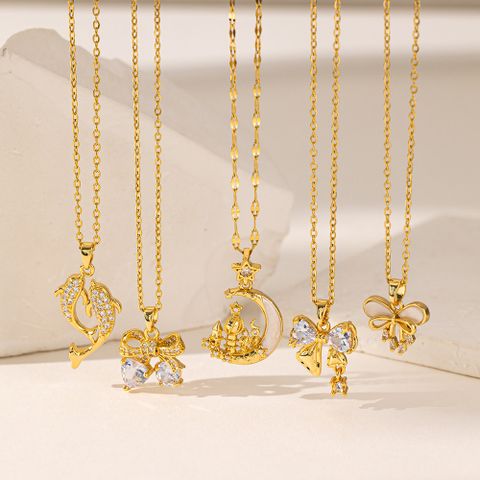 Wholesale Elegant Artistic Commute Moon Dolphin Bow Knot 304 Stainless Steel Polishing Inlay 18K Gold Plated Acrylic Artificial Rhinestones Pendant Necklace