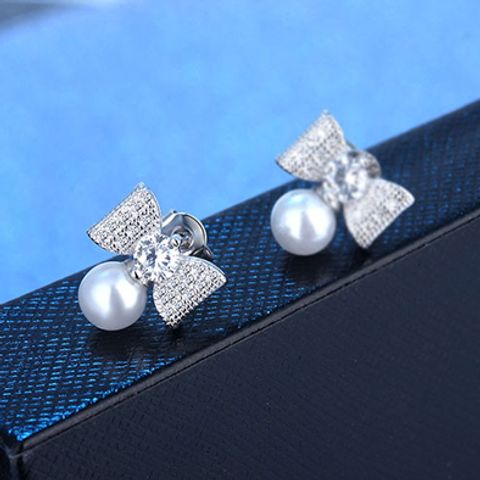 1 Pair Elegant Modern Style Commute Bow Knot Inlay Copper Artificial Pearls Zircon Drop Earrings