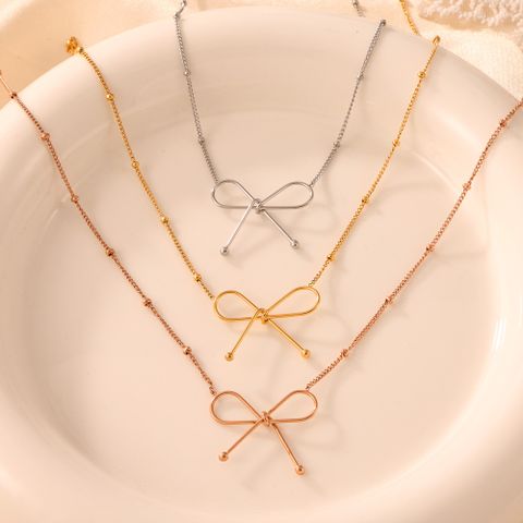 Titan Stahl 18 Karat Vergoldet Lässig Einfacher Stil Pendeln Überzug Bogenknoten Armbänder Halskette