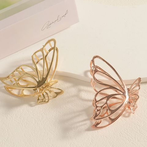 Women's Sweet Artistic Solid Color Butterfly Alloy Criss Cross Hollow Out Hair Claws