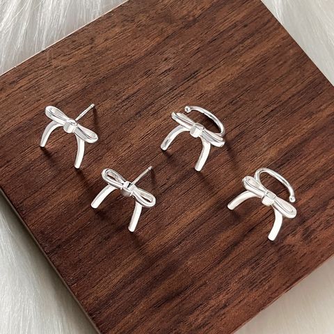 1 Pair Simple Style Bow Knot Plating Sterling Silver Ear Cuffs Ear Studs