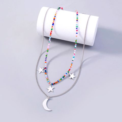 Einfacher Stil Klassischer Stil Stern Mond Harz Kupfer Perlen Frau Geschichtete Halskette