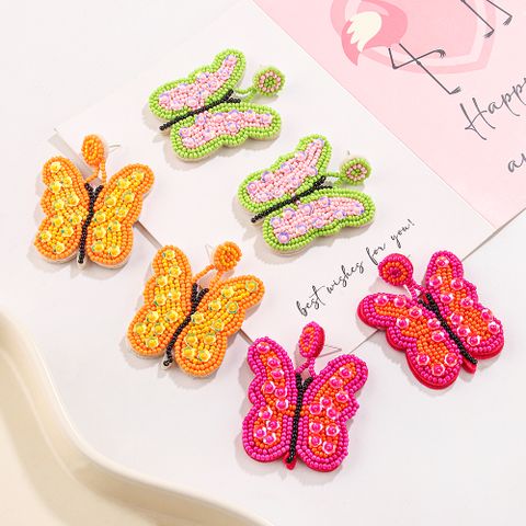 1 Pair Cute Exaggerated Sweet Butterfly Beaded Handmade Braid Beaded Nonwoven Glass Drop Earrings