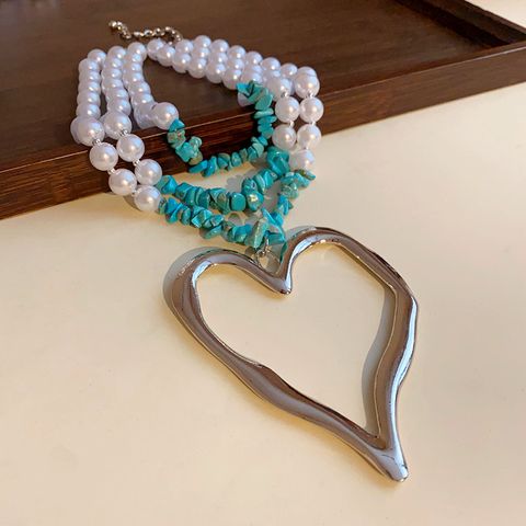 Glam Exaggerated Heart Shape Imitation Pearl Alloy Wholesale Pendant Necklace