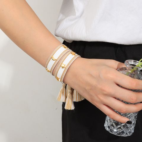 Simple Style Classic Style Star Polyester Tassel Braid Women's Drawstring Bracelets