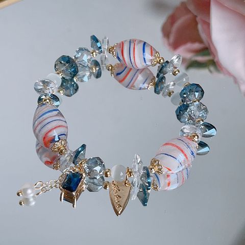 Style Simple Style Classique Géométrique Rond Verre/Glaçure Colorée Irrégulière Perlé Femmes Bracelets