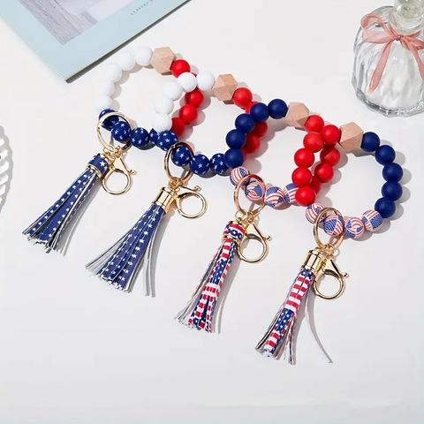 IG Style Classic Style Sports National Flag Round Pu Leather Silica Gel Metal Beaded Handmade Tassel Independence Day American National Day Bag Pendant Keychain