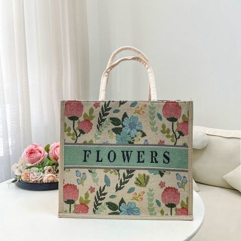 Women's Medium Cotton And Linen Letter Flower Streetwear Magnetic Buckle Tote Bag