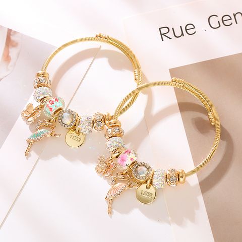 Wholesale Jewelry Casual Vacation Classic Style Cartoon Character Butterfly 304 Stainless Steel Alloy Rhinestones Gold Plated Beaded Inlay Bangle