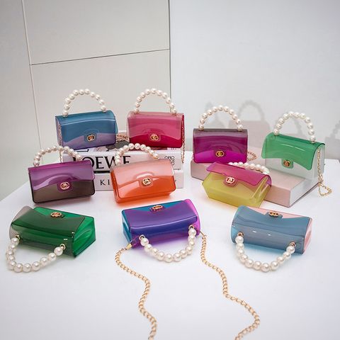 Women's Small PVC Solid Color Basic Streetwear Lock Clasp Jelly Bag