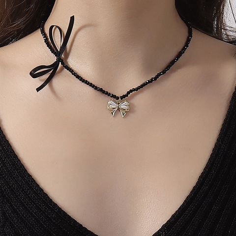 Elegant Vintage Style French Style Bow Knot Pearl Arylic Synthetic Resin Alloy Wholesale Necklace