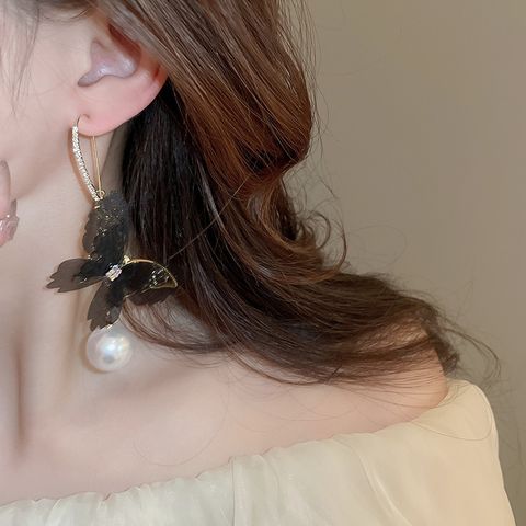 1 Pair Elegant Lady Streetwear Butterfly Inlay Zinc Alloy Artificial Pearls Drop Earrings