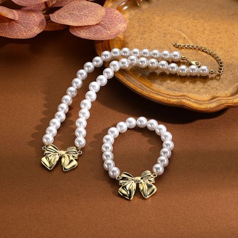 Casual Simple Style Bow Knot Imitation Pearl Alloy Wholesale Bracelets Earrings Necklace