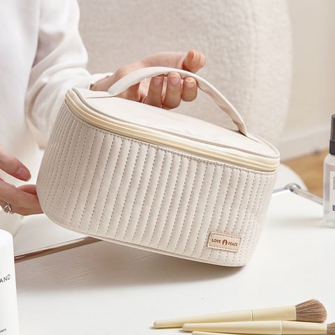 New Pu Cake Cosmetic Bag Hand Travel Cosmetics Storage Bag Portable Travel Wash Bag Factory Wholesale