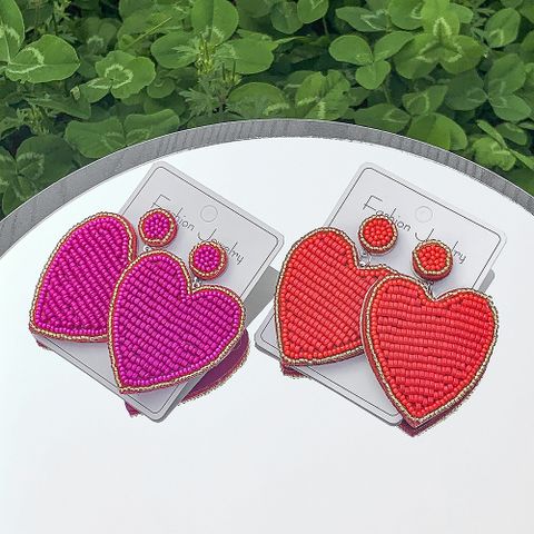 1 Pair Elegant Sweet Classic Style Heart Shape Beaded Beaded Nonwoven Glass Drop Earrings