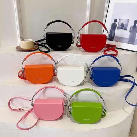 Women's Small Pu Leather Solid Color Streetwear Magnetic Buckle Saddle Bag