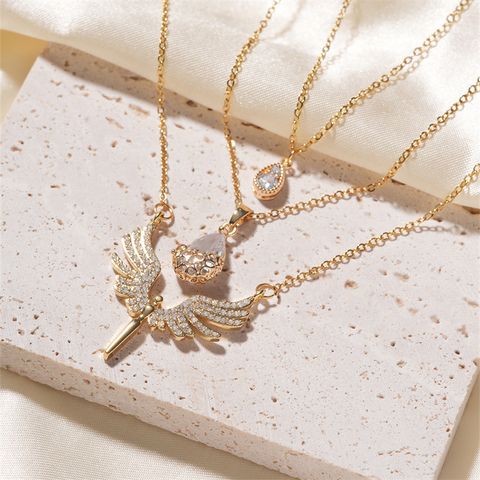 Wholesale IG Style Shiny Angel Water Droplets Copper Inlay K Gold Plated Zircon Pendant Necklace