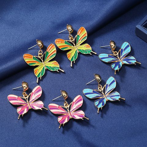 1 Par Elegante Mariposa Esmalte Aleación Chapado En Oro Pendientes De Gota