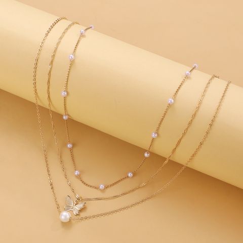 Simple Style Butterfly Iron Pearl Women's Layered Necklaces